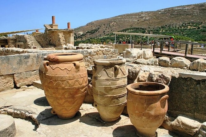 Ancient palace ruins with restored frescoes at Knossos in Crete